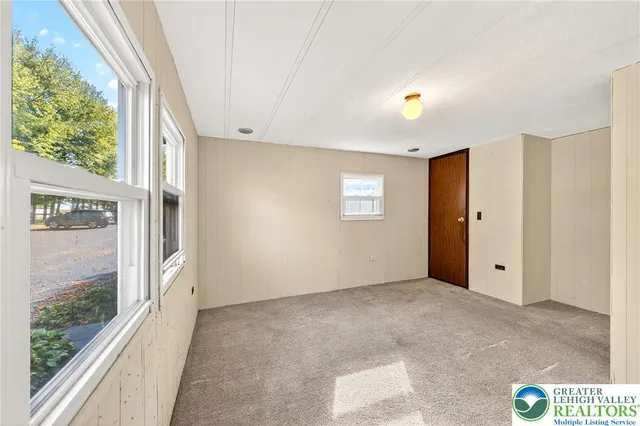 a bathroom with a sink toilet and mirror