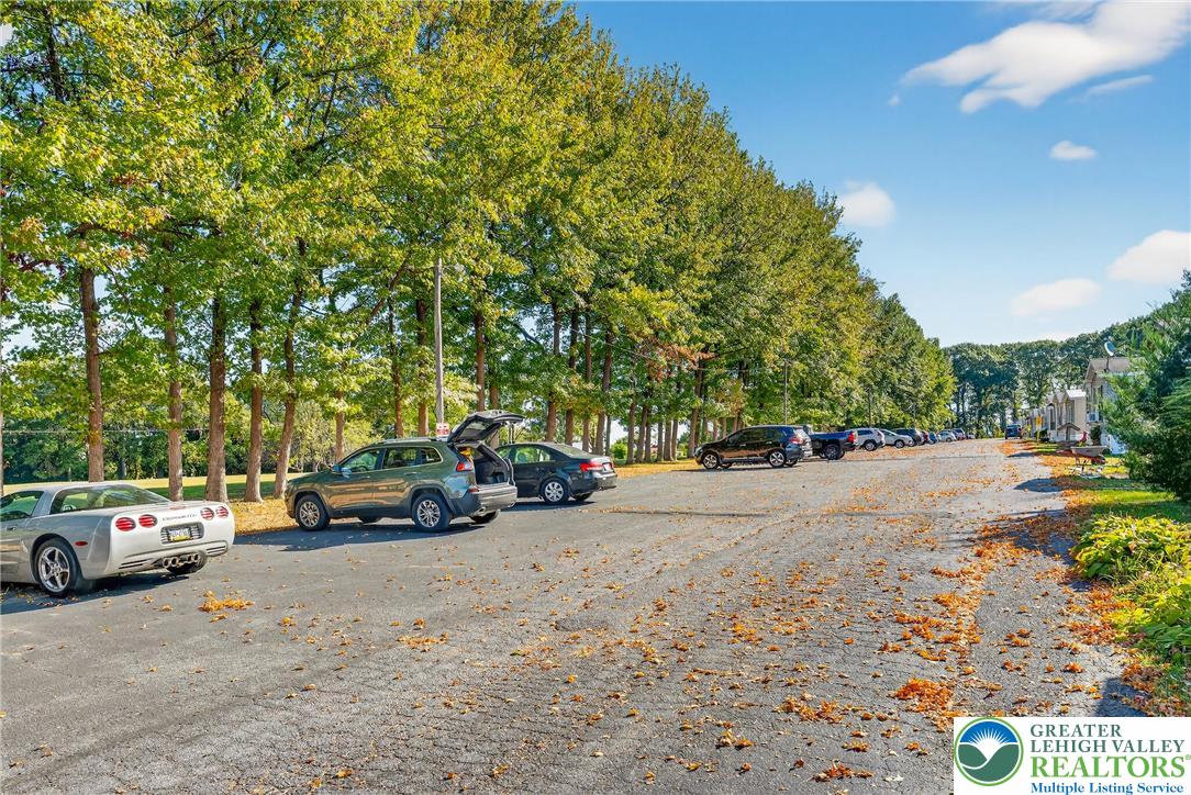 8220 Airport Road, Unit 4 Coatesville, PA 19320 - Photo 3 of 28 a view of car parked on the side of the road
