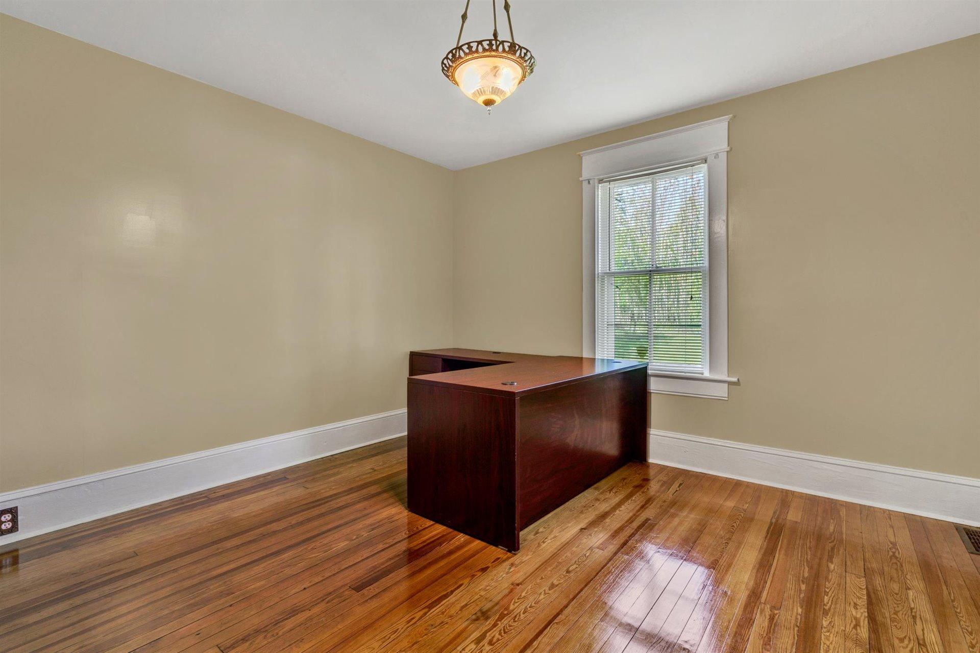 3840 Cove Road Roanoke, VA 24017 - Photo 20 of 47 a living room with wooden floor and a window