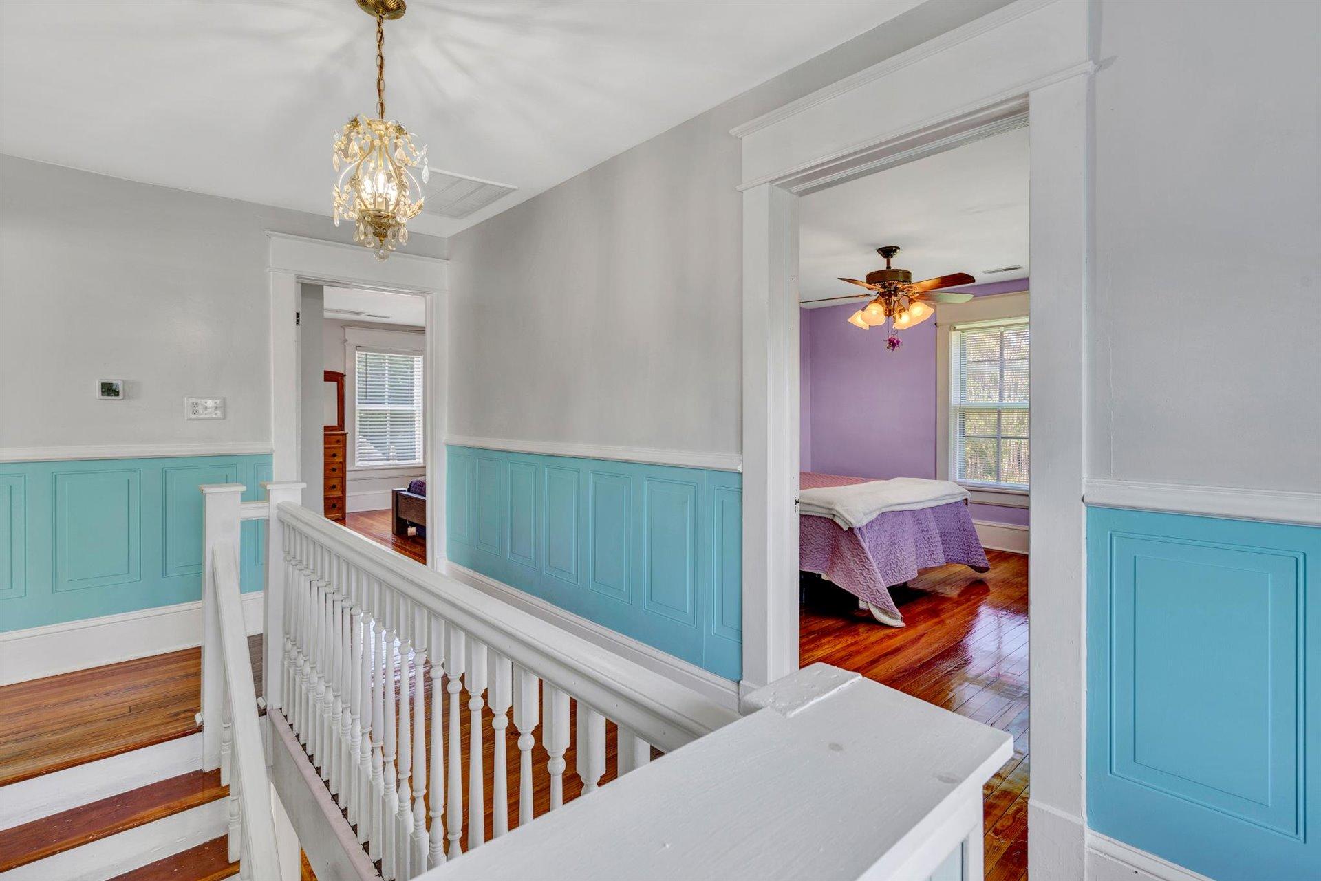 3840 Cove Road Roanoke, VA 24017 - Photo 22 of 47 a view of a hallway to a livingroom and a chandelier