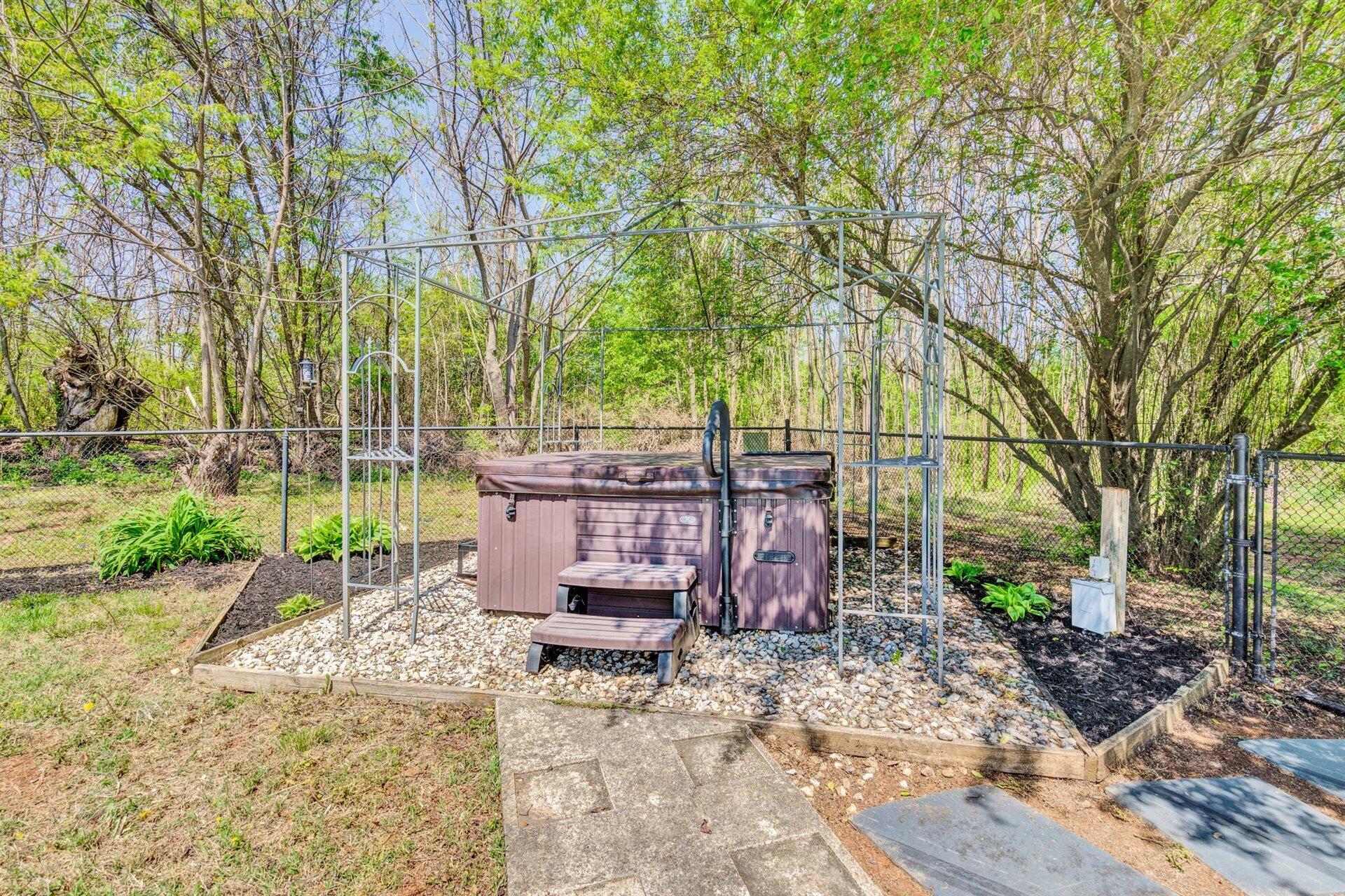 3840 Cove Road Roanoke, VA 24017 - Photo 36 of 47 a view of a backyard with sitting area furniture and garden