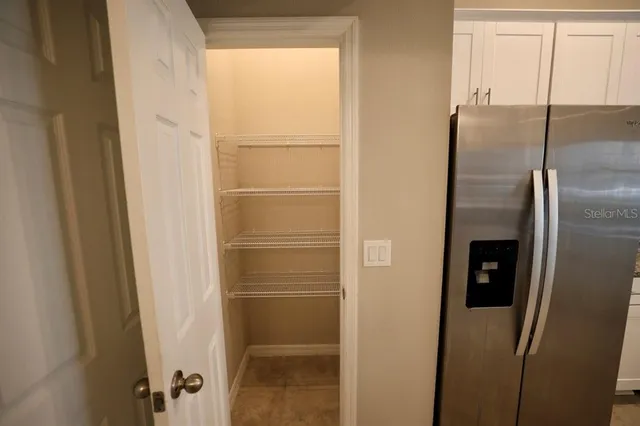 a bathroom with a shower and a toilet