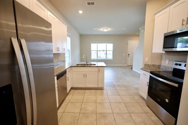 a view of a room with an empty space