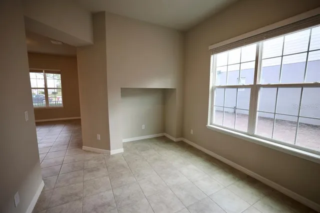 a bathroom with a glass door shower