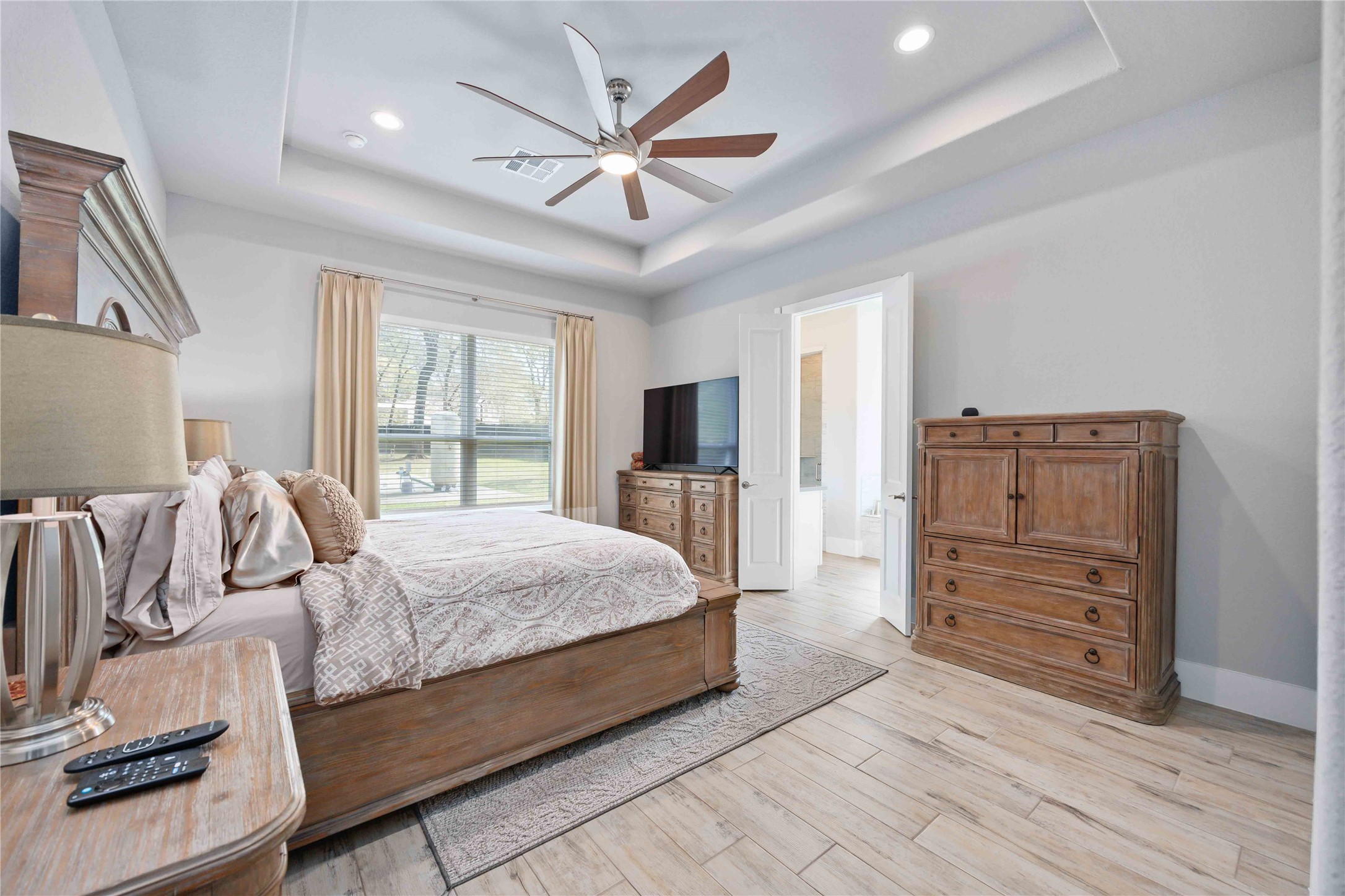 33510 Walnut Crossing Magnolia, TX 77355 - Photo 12 of 50 Enjoy a generously sized primary bedroom with a private ensuite.