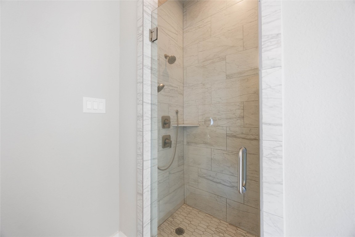 33510 Walnut Crossing Magnolia, TX 77355 - Photo 16 of 50 Enjoy a dedicated walk-in shower designed for comfort, ease, and a refreshing start to your day.