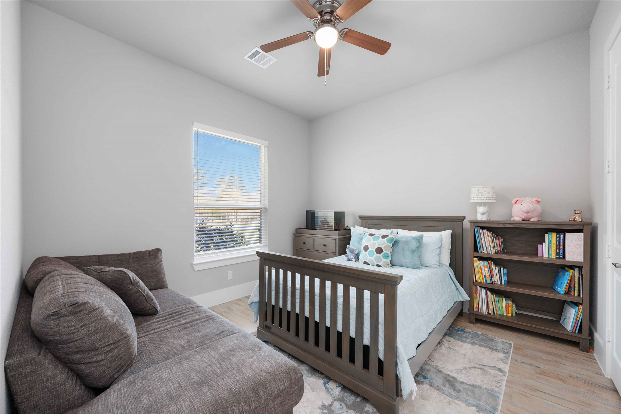 33510 Walnut Crossing Magnolia, TX 77355 - Photo 22 of 50 Enjoy a spacious secondary bedroom filled with natural light.