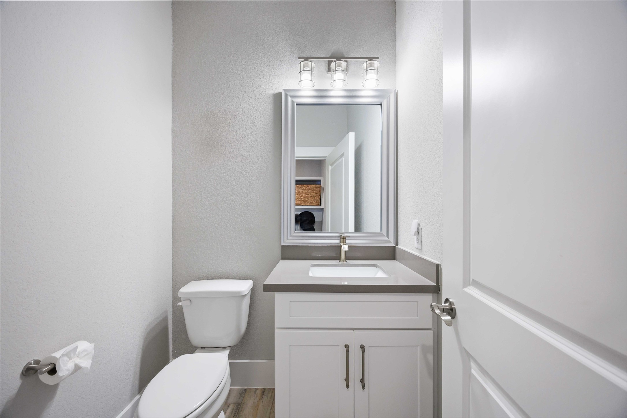 33510 Walnut Crossing Magnolia, TX 77355 - Photo 24 of 50 A well-placed downstairs half bath offers added convenience for guests and seamless access from the main living spaces.