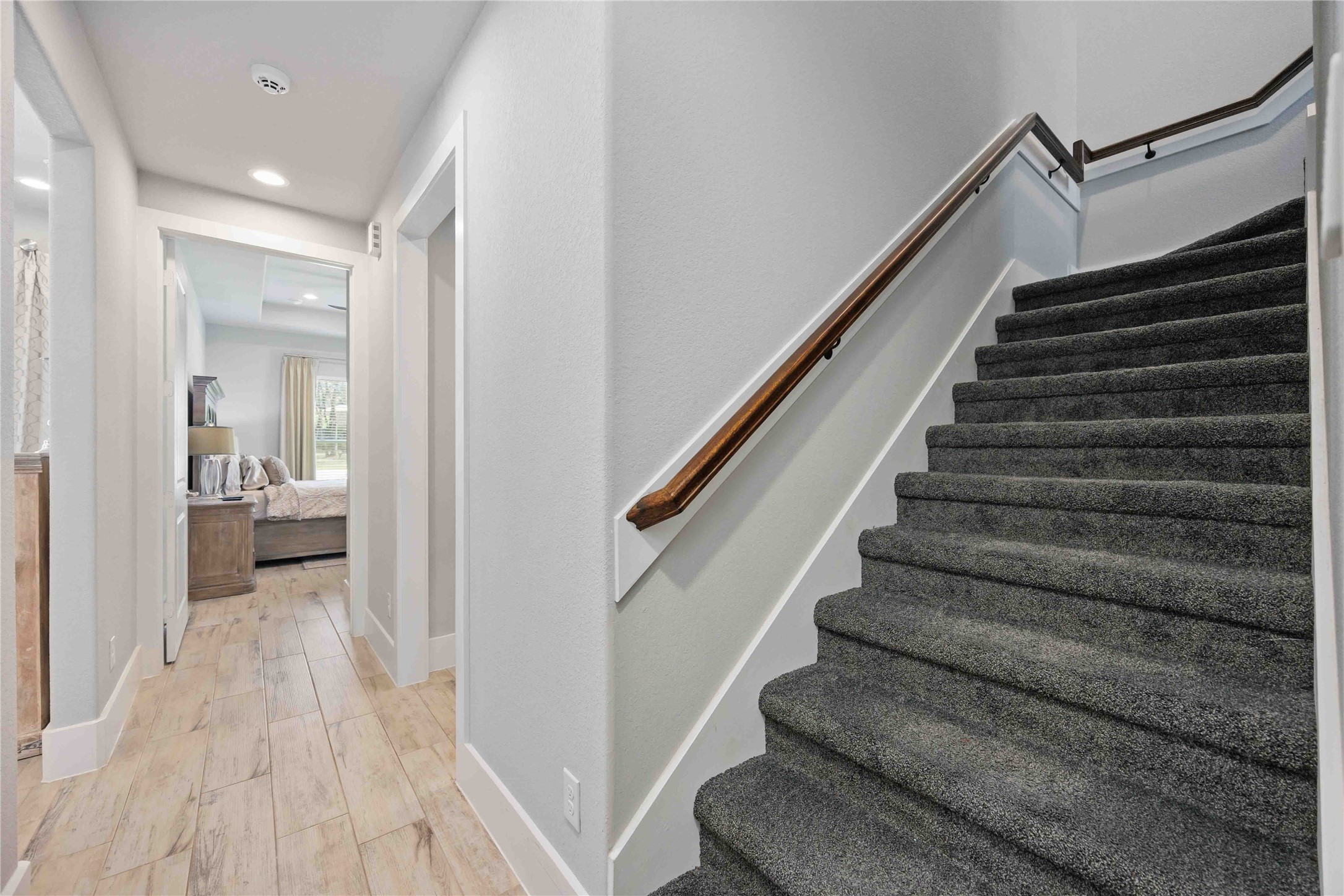 33510 Walnut Crossing Magnolia, TX 77355 - Photo 25 of 50 Staircase leads to the upstairs game room and fifth bedroom, offering added space and flexibility.