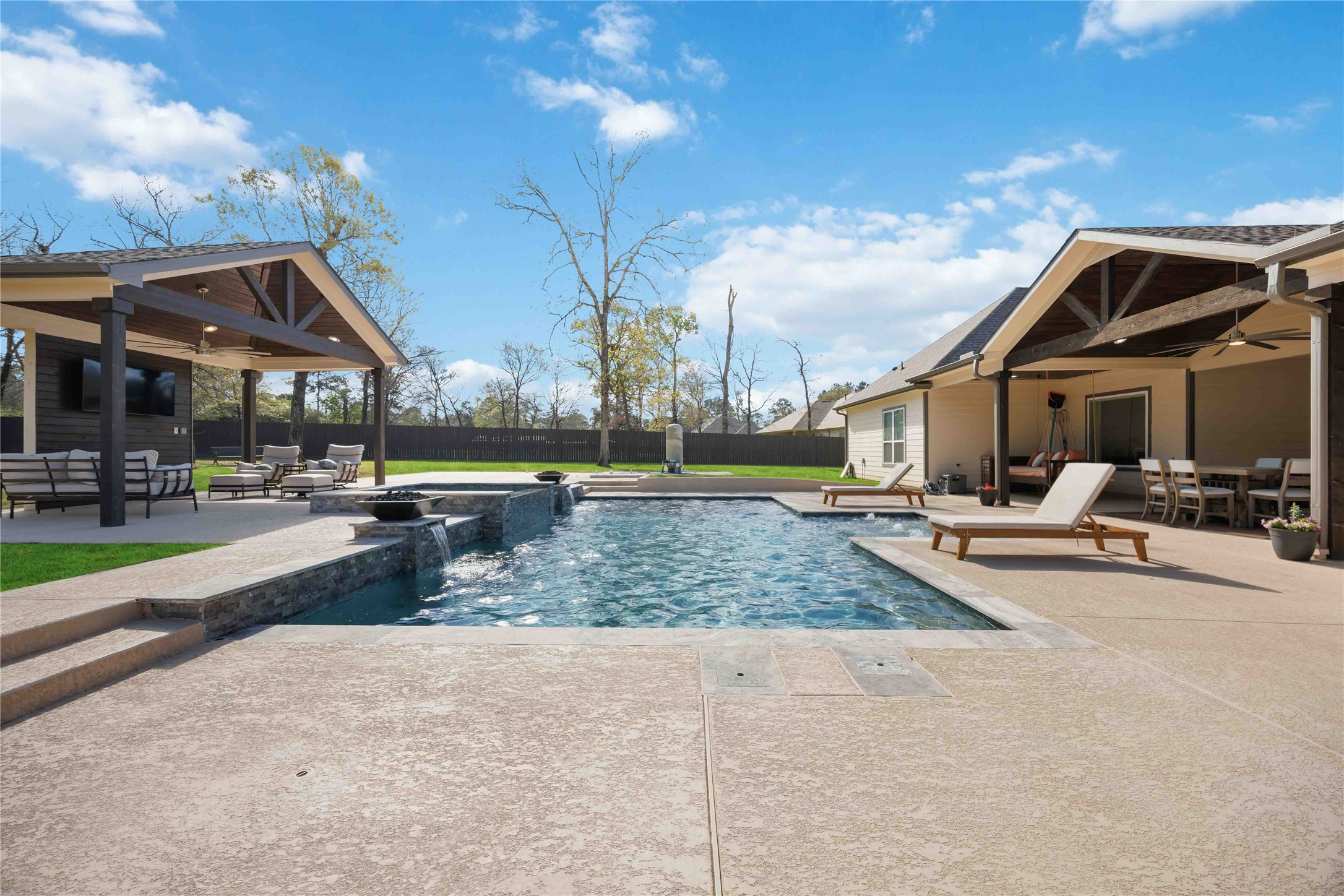 33510 Walnut Crossing Magnolia, TX 77355 - Photo 37 of 50 Unwind poolside in a space designed to offer comfort, privacy, and a true outdoor living experience.