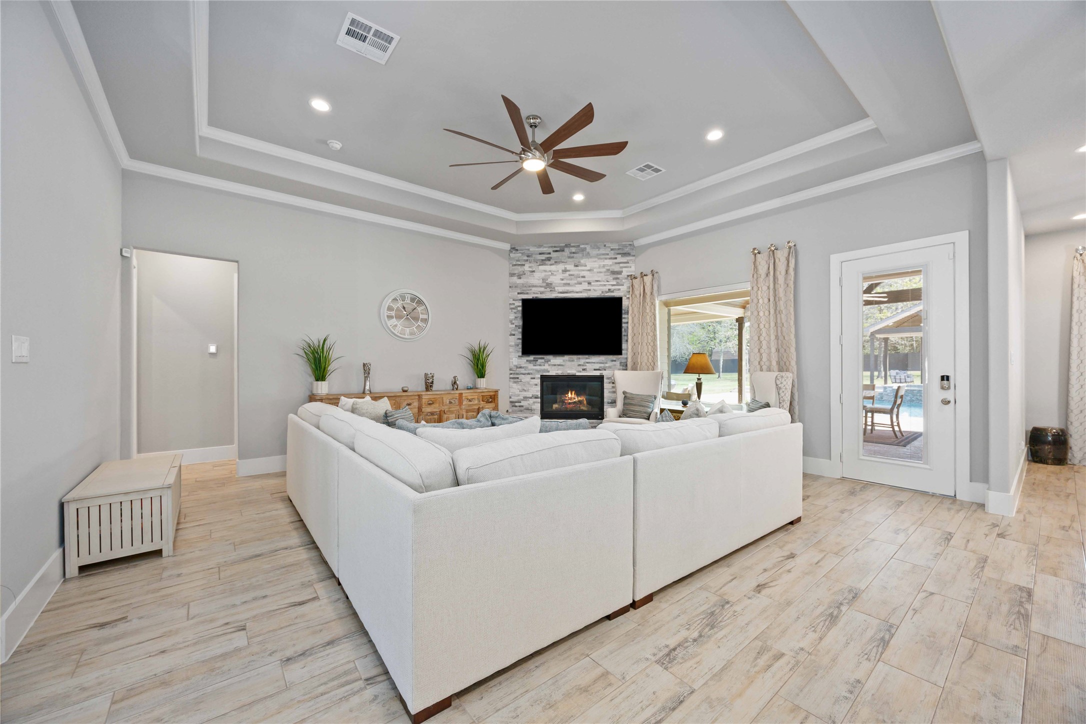 33510 Walnut Crossing Magnolia, TX 77355 - Photo 4 of 50 Natural light fills the room, creating a warm and inviting atmosphere throughout the day.
