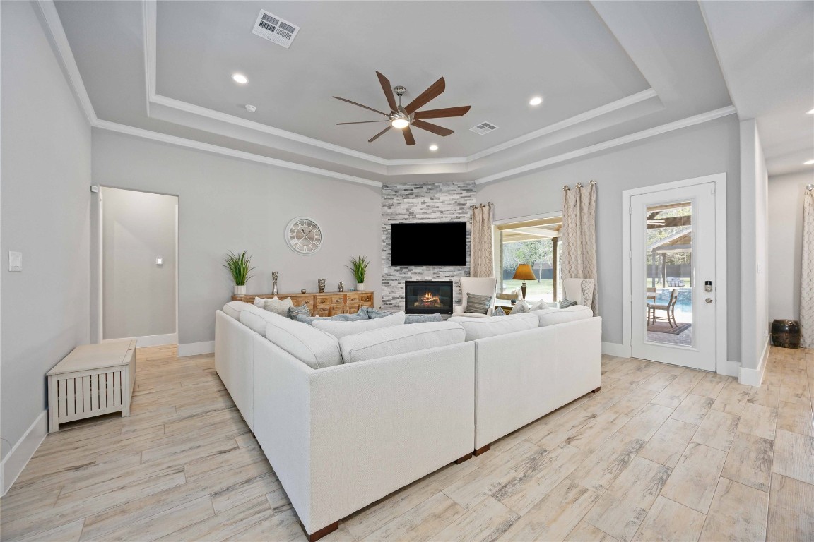 33510 Walnut Crossing Magnolia, TX 77355 - Photo 4 of 50 Natural light fills the room, creating a warm and inviting atmosphere throughout the day.