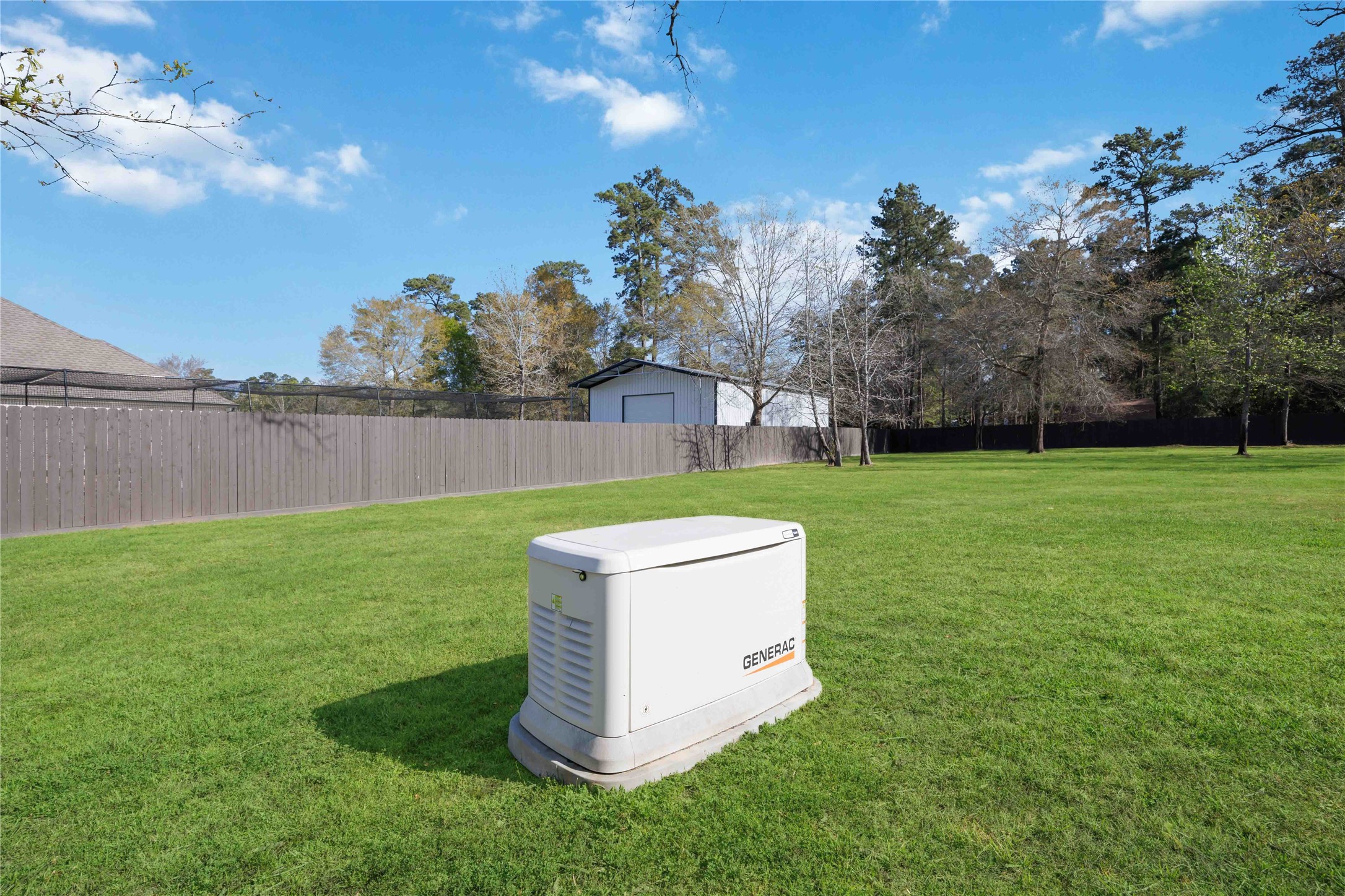 33510 Walnut Crossing Magnolia, TX 77355 - Photo 42 of 50 Enjoy added peace of mind with a whole-home generator, providing reliable power when you need it most.