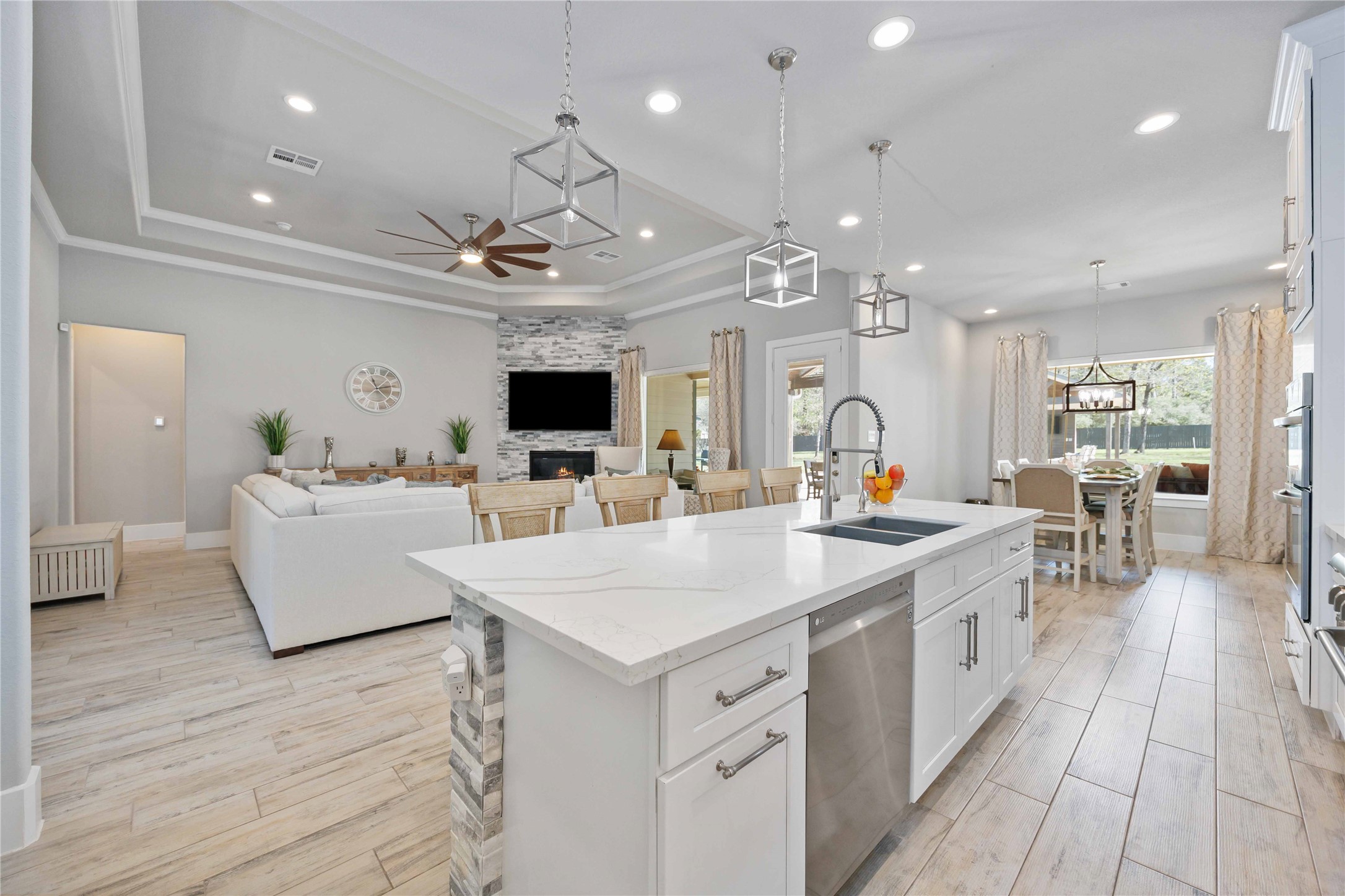 33510 Walnut Crossing Magnolia, TX 77355 - Photo 9 of 50 A kitchen designed to bring people together, featuring a large island perfect for casual meals and conversation.