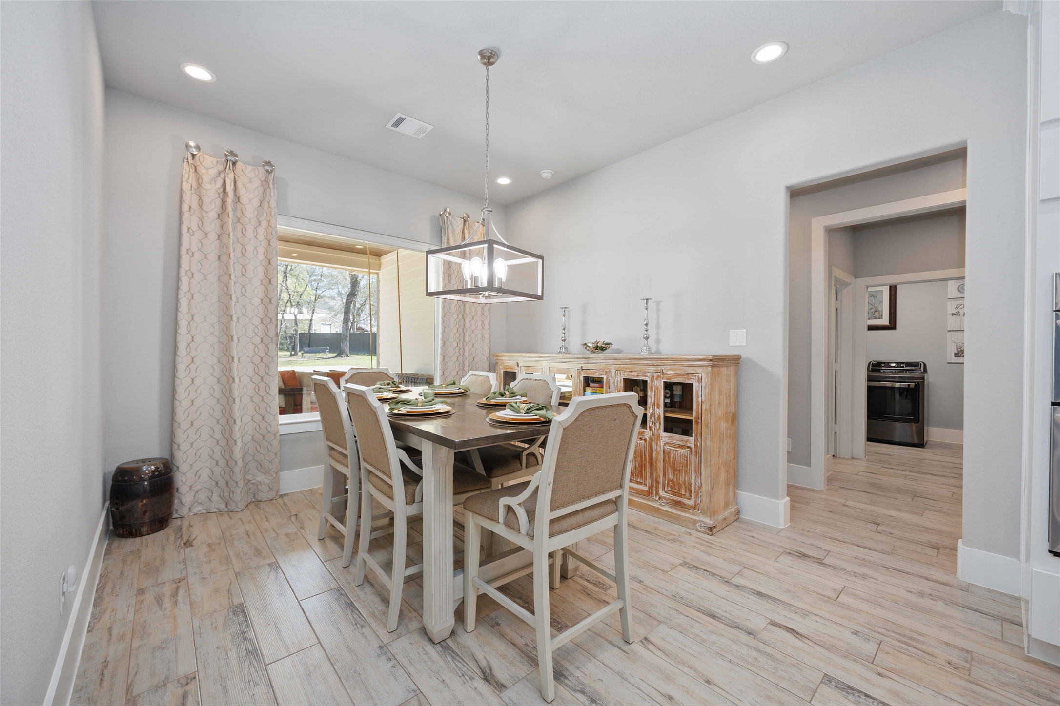 33510 Walnut Crossing Magnolia, TX 77355 - Photo 10 of 50 A comfortable dining space that makes everyday meals and special occasions feel equally inviting.