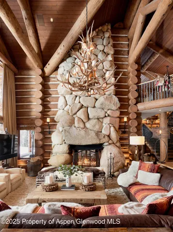 a living room with large windows