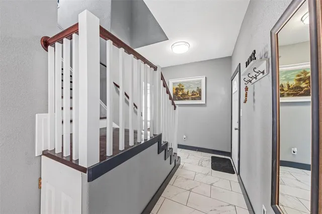 a view of an entryway with staircase