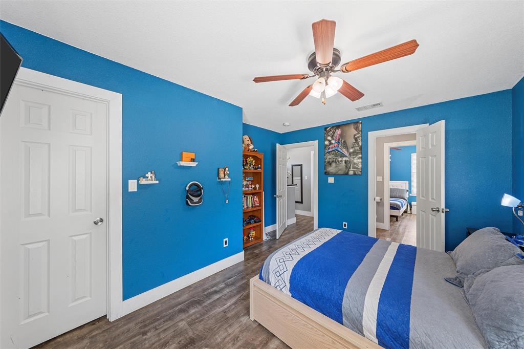 1205 North 17th Street Waco, TX 76707 - Photo 25 of 38 Bedroom featuring wood finished floors and ceiling fan