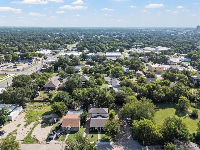 an aerial view of a city with lots of residential buildings
