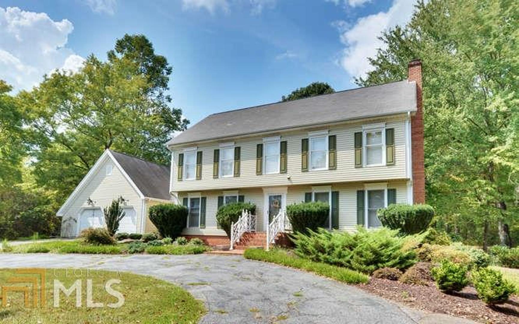 385 Crestview Road Demorest, GA 30535 - Photo 1 of 1 a view of a house with garden