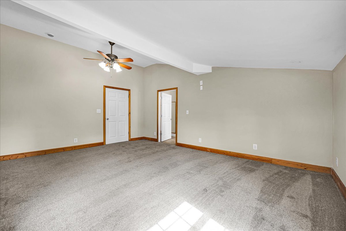 116 Lakeview Road East Galesburg, IL 61430 - Photo 16 of 36 a view of an empty room with a window