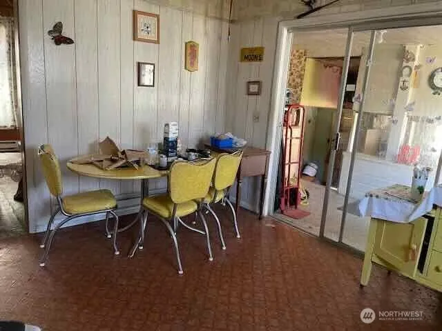 a bathroom with a toilet a sink and a mirror
