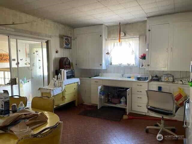 191 Mineral Road North Mineral, WA 98355 - Photo 18 of 32 a living room with furniture and a fireplace