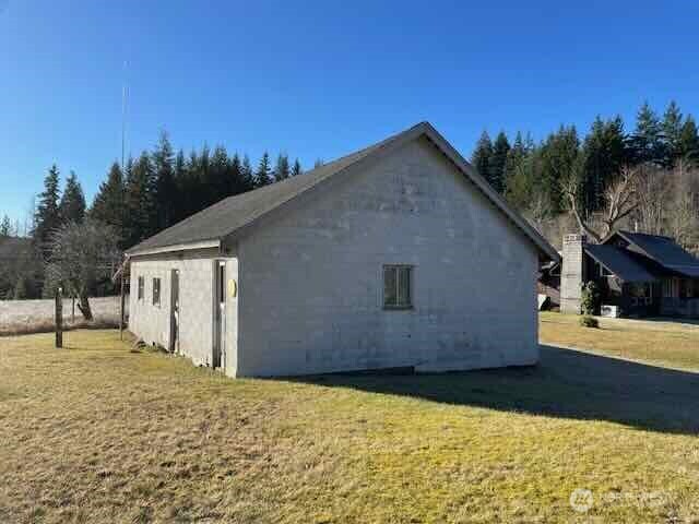 191 Mineral Road North Mineral, WA 98355 - Photo 25 of 32 a backyard of a house with yard and outdoor seating