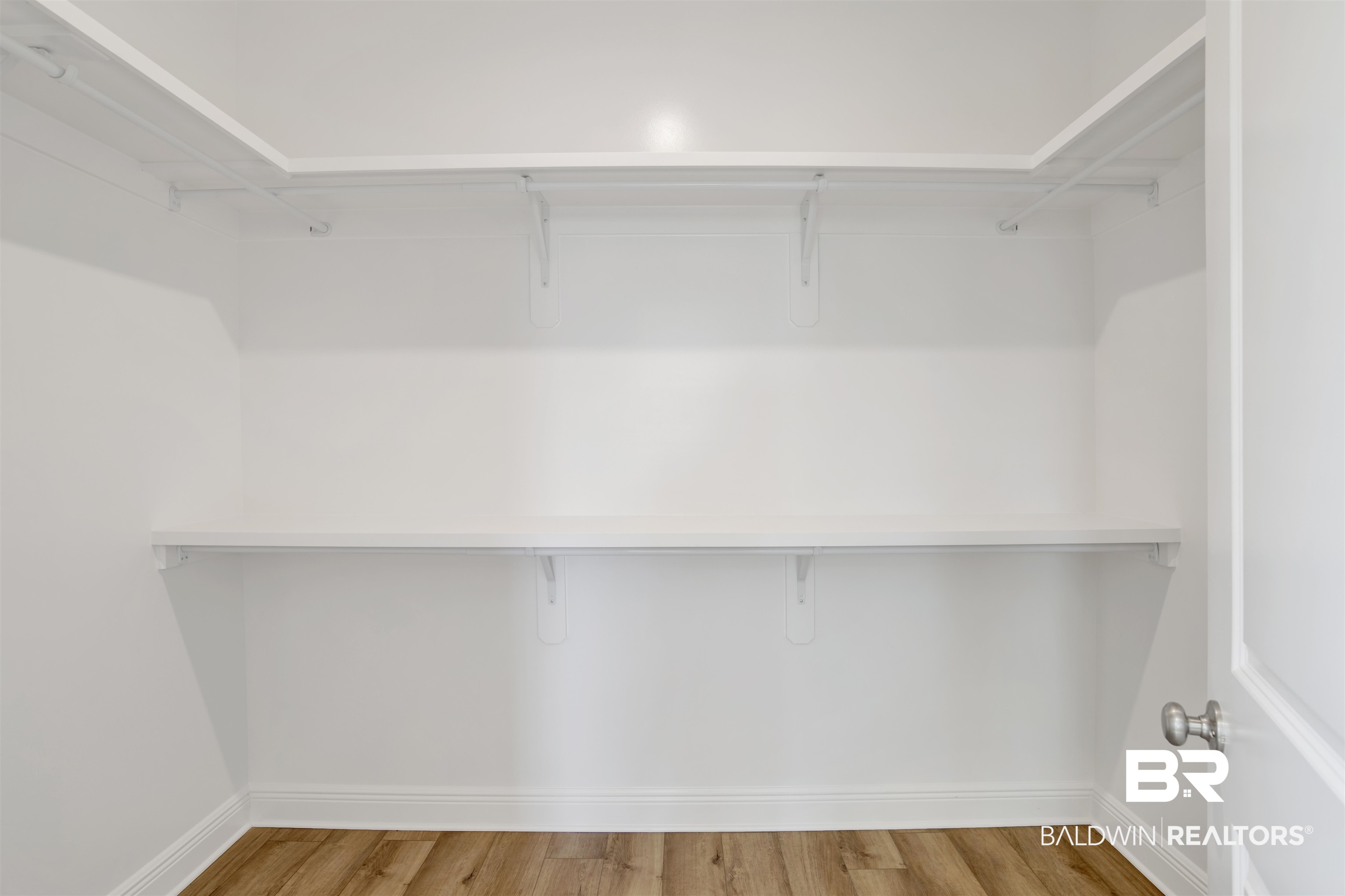 23852 Lafite Circle Daphne, AL 36526 - Photo 18 of 30 Spacious closet with light wood finished floors
