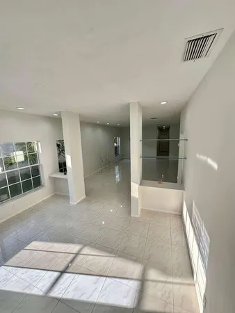 a bathroom with a sink a mirror and a toilet