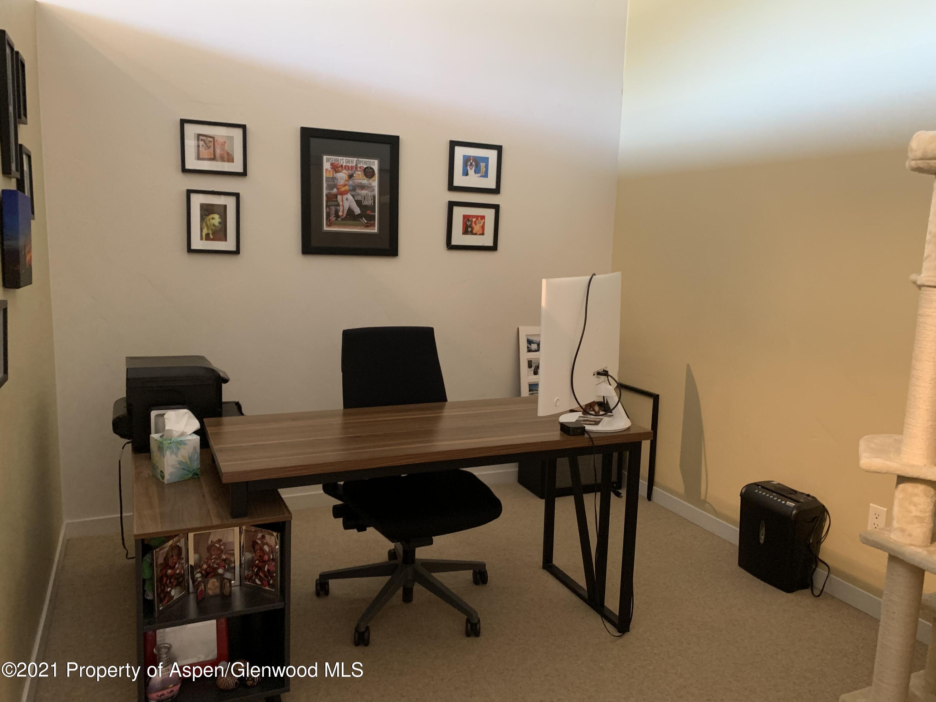 231 Robinson Street, Unit R302 Basalt, CO 81621 - Photo 11 of 31 a view of a workspace with a couch