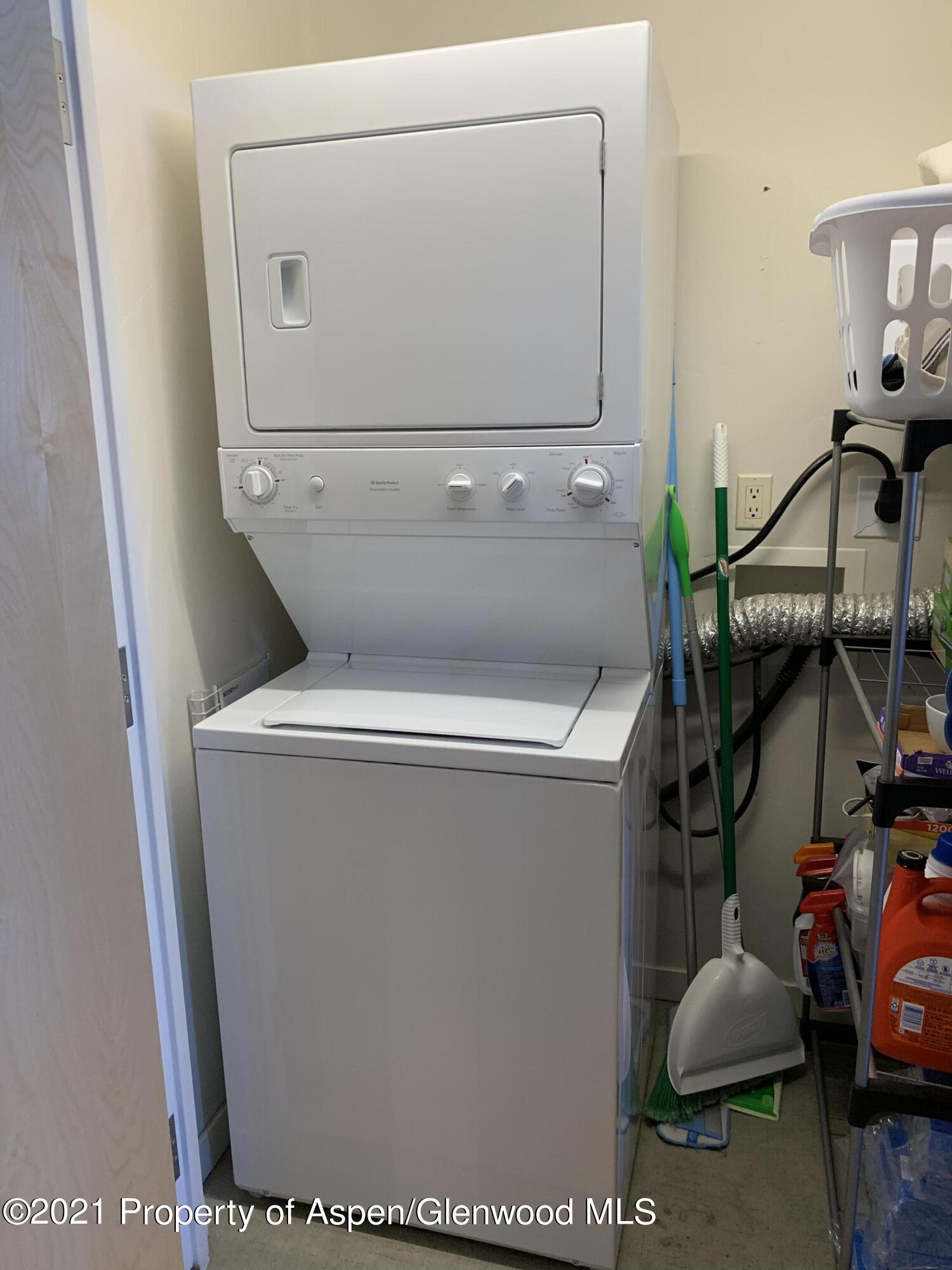 231 Robinson Street, Unit R302 Basalt, CO 81621 - Photo 13 of 31 a utility room with dryer and washer