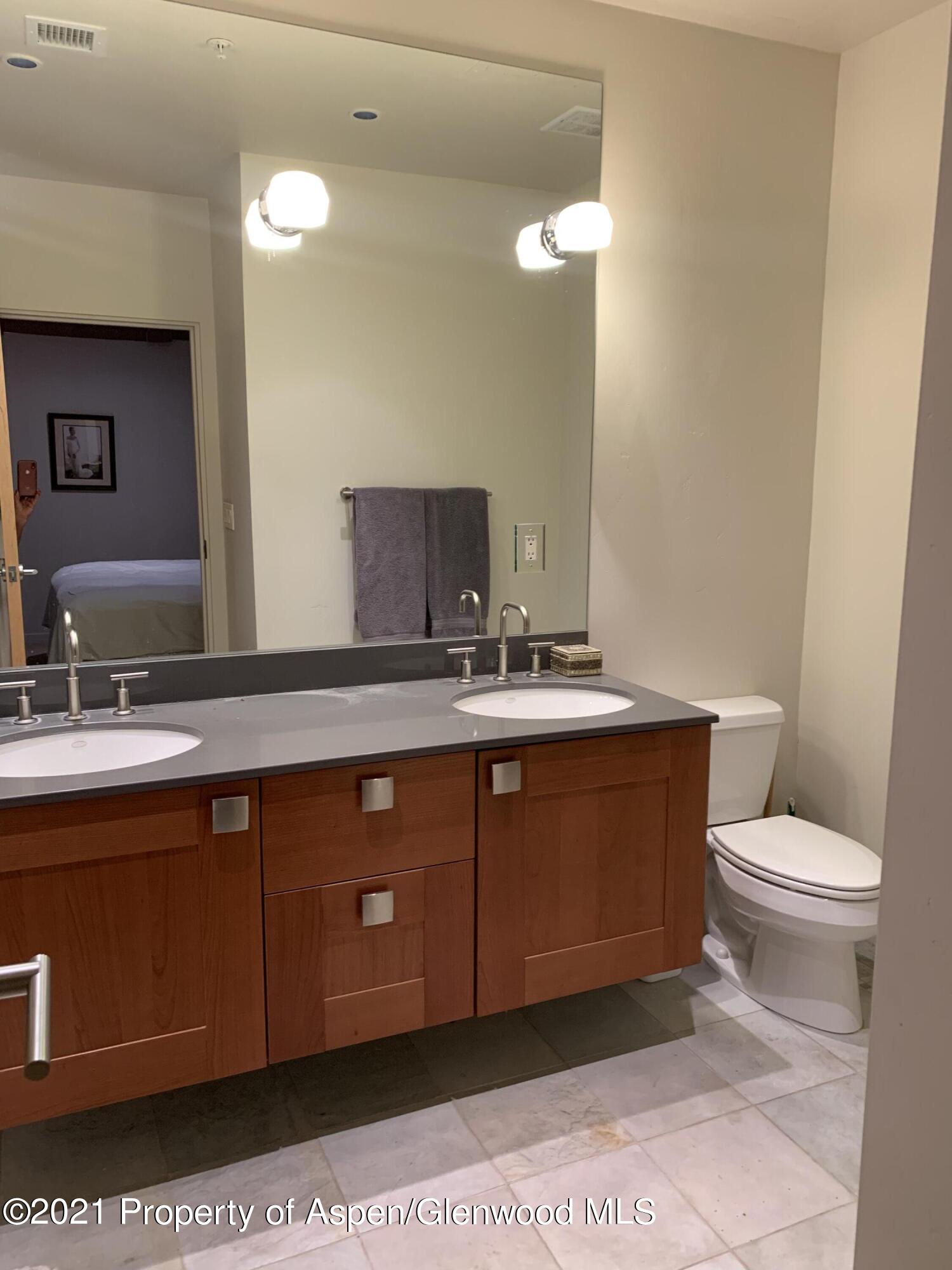231 Robinson Street, Unit R302 Basalt, CO 81621 - Photo 18 of 31 a bathroom with a sink and a toilet