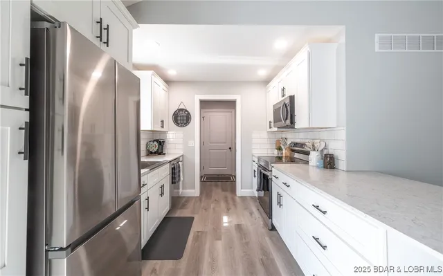 $319,700 | 400 Partridge Drive, Climax Springs, MO 65324