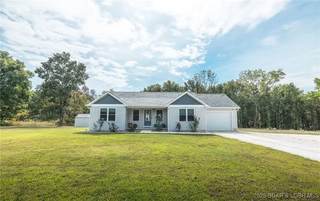 $319,700 | 400 Partridge Drive, Climax Springs, MO 65324