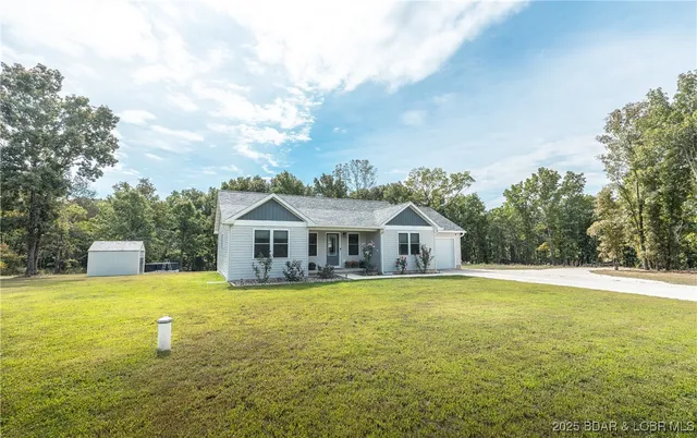 $319,700 | 400 Partridge Drive, Climax Springs, MO 65324
