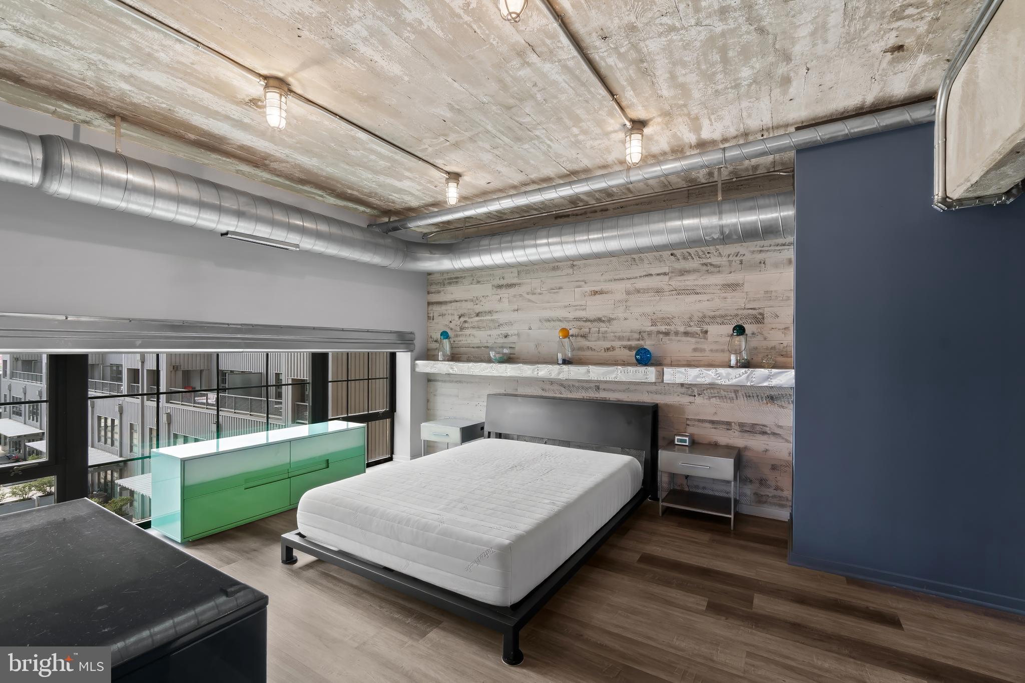 1200 Steuart Street, Unit 1119 Baltimore, MD 21230 - Photo 27 of 37 a room with pool table and windows