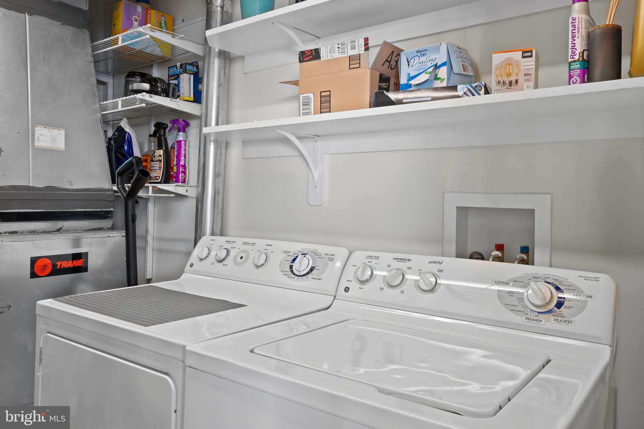 1200 Steuart Street, Unit 1119 Baltimore, MD 21230 - Photo 29 of 37 a utility room with dryer and washer