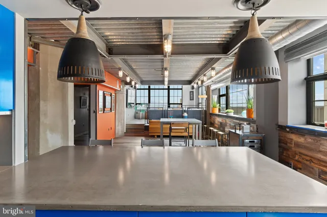 a view of kitchen with cabinets and wooden floor