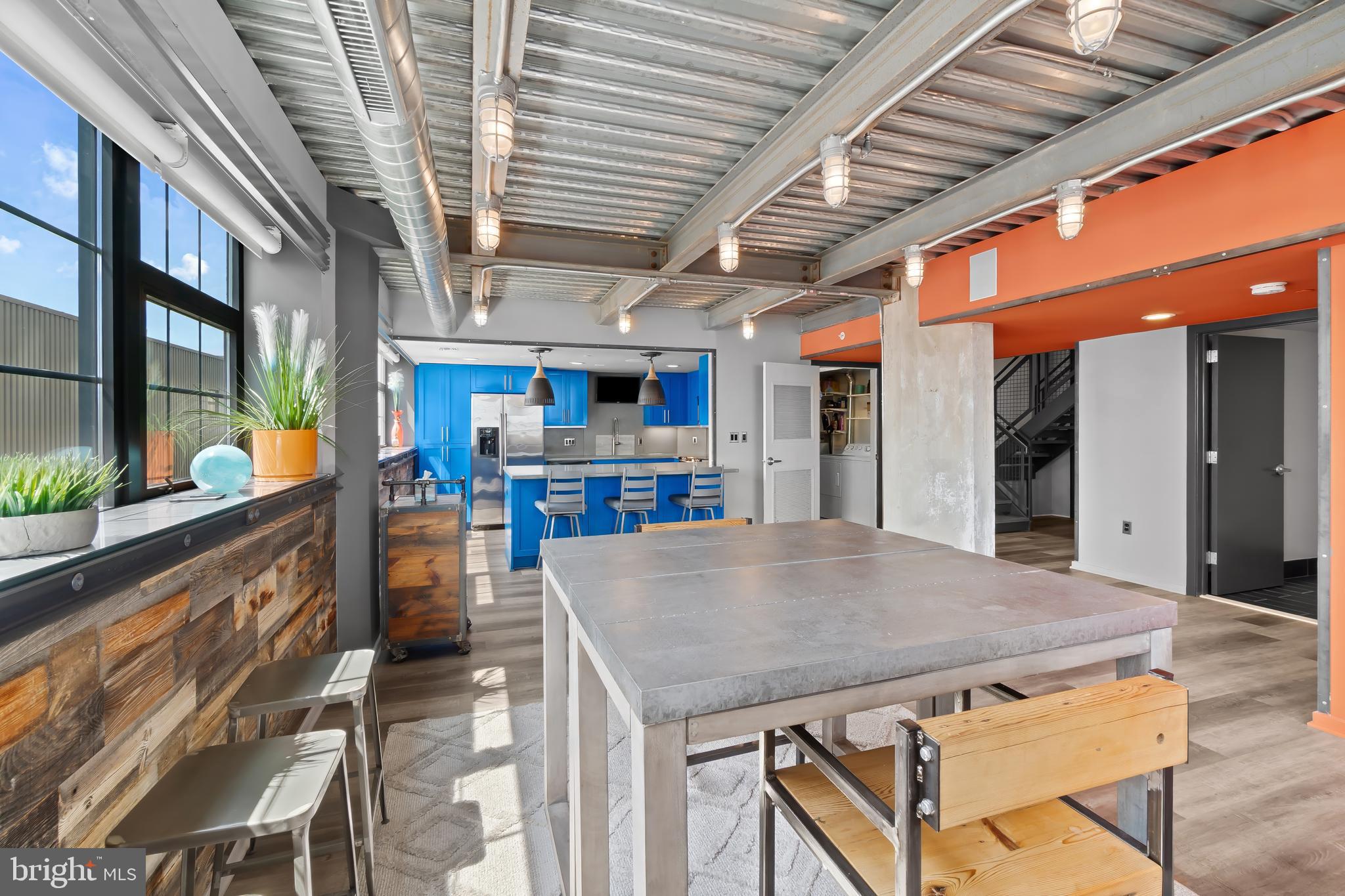 1200 Steuart Street, Unit 1119 Baltimore, MD 21230 - Photo 7 of 37 a view of kitchen with cabinets and wooden floor
