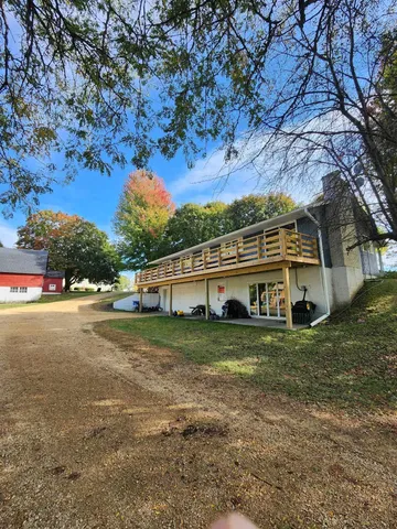 a view of a balcony with chairs