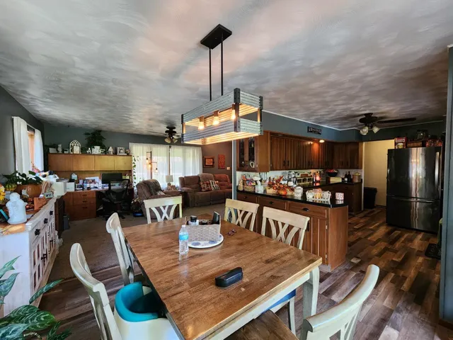 a view of a dining room with furniture