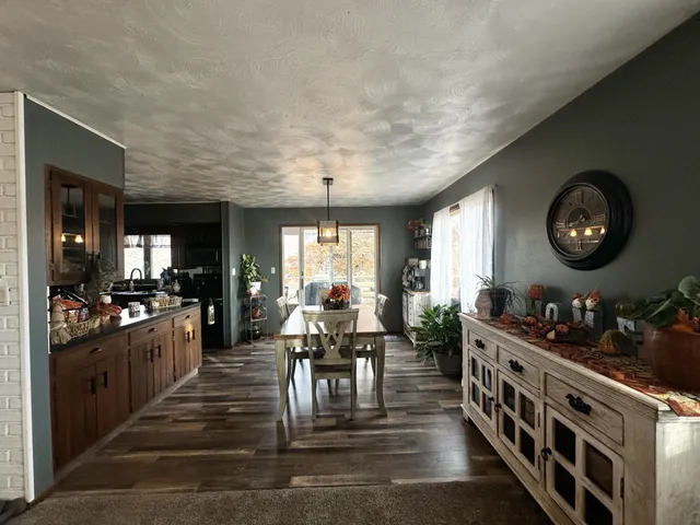 a large kitchen with lots of counter space and stainless steel appliances