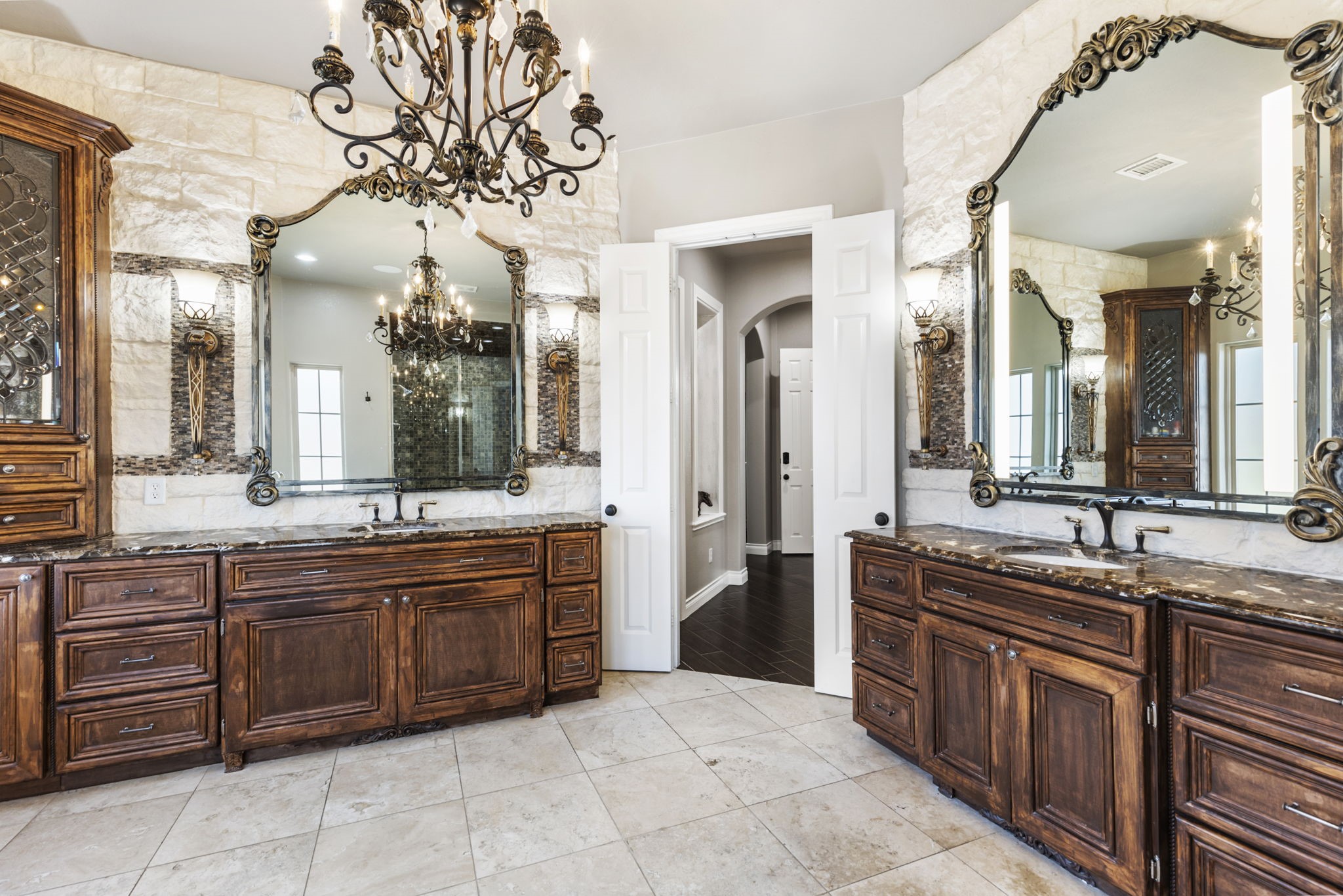 7930 Spring Village Drive Spring, TX 77389 - Photo 18 of 42 Luxurious primary bath has double vanities and counter space.