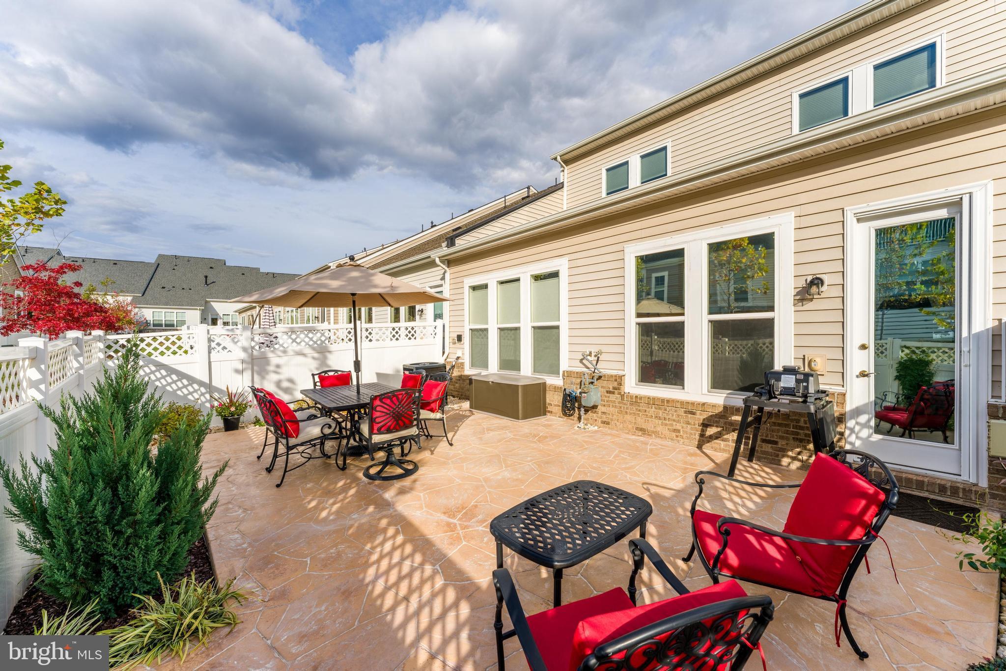 23707 Kinston Ferry Terrace Ashburn, VA 20148 - Photo 12 of 42 a view of a chairs and table in a patio
