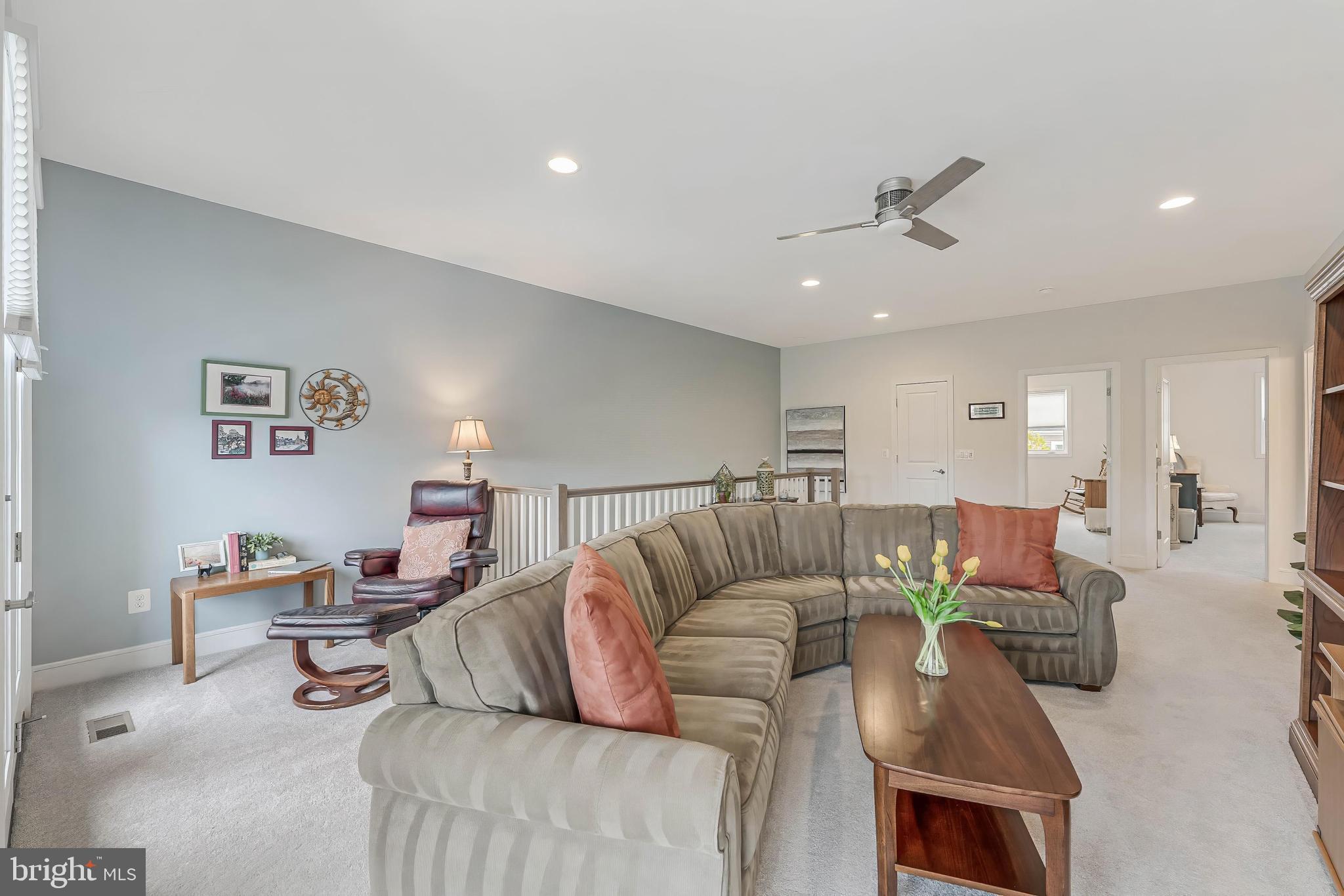 23707 Kinston Ferry Terrace Ashburn, VA 20148 - Photo 23 of 42 a living room with furniture