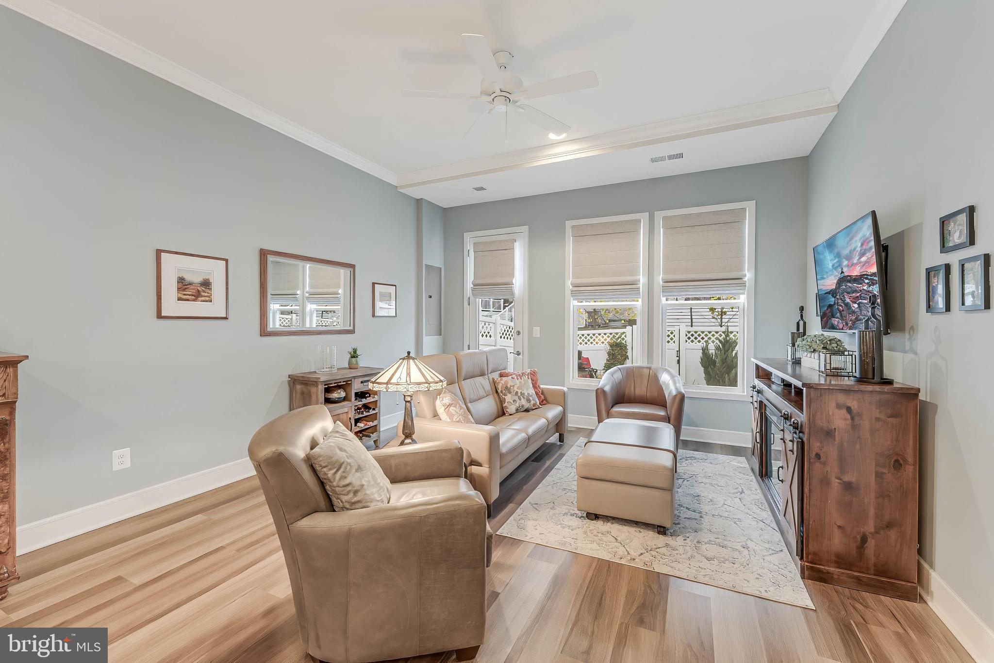 23707 Kinston Ferry Terrace Ashburn, VA 20148 - Photo 10 of 42 a living room with furniture and a large window