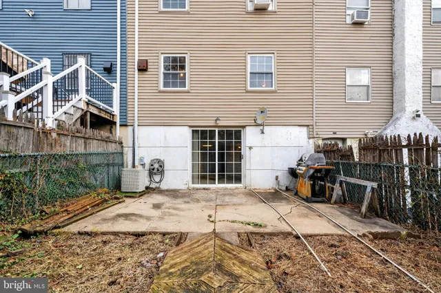 a front view of a house with a patio