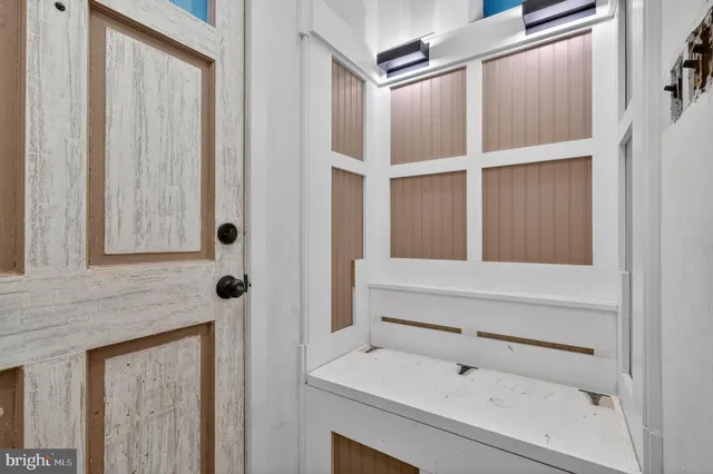 a bathroom with a shower and a sink