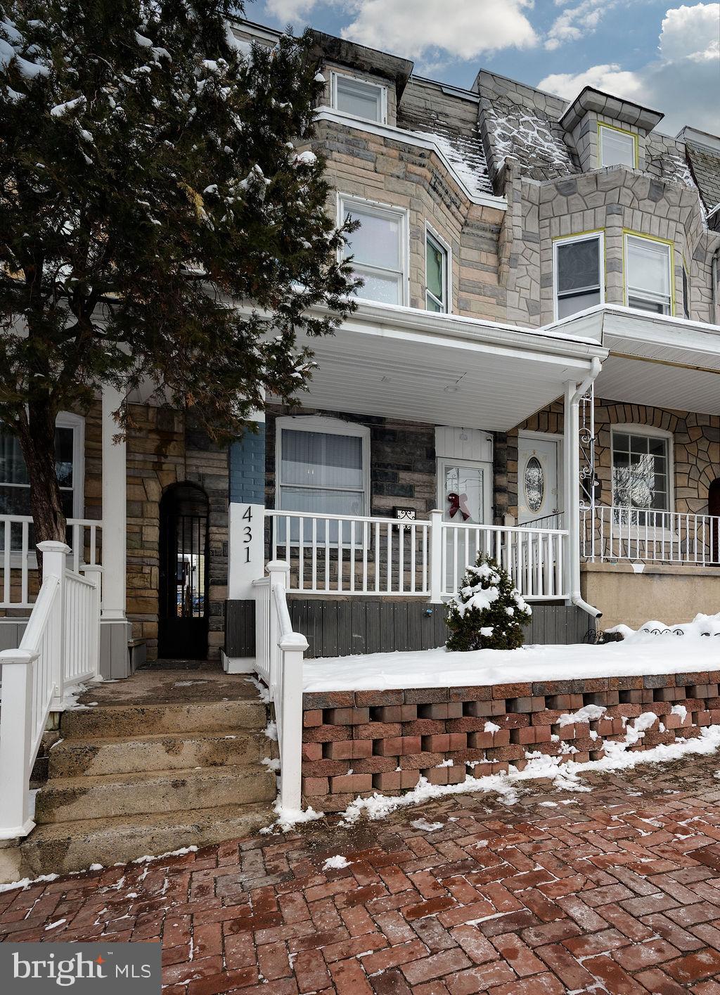 431 South 11th Street Reading, PA 19602 - Photo 3 of 43 Charming stone-front home in winter's embrace.